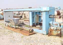 Used Durco Quadra Press Filter Press Frame Only. Requires 48" x 48" plates. 17'10" fully opened, 14'10" closed length. Center feed, 4 corner discharge. Upper side bars. Double ram closure. Unit inclu...