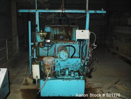 USED: Edwards and Jones filter press. 1200mm x 1200mm polypropylene plates, 36 plates. Approximately 500 sq ft of filtration area. Press includes a plate shifter. Center feed corner discharge, hydrau...