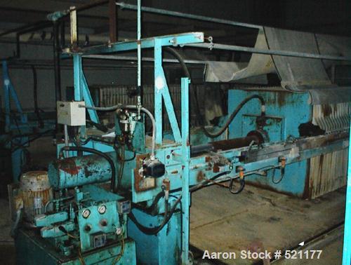 USED: Edwards and Jones filter press. 1200mm x 1200mm polypropylene plates, 36 plates. Approximately 500 sq ft of filtration area. Press includes a plate shifter. Center feed corner discharge, hydrau...