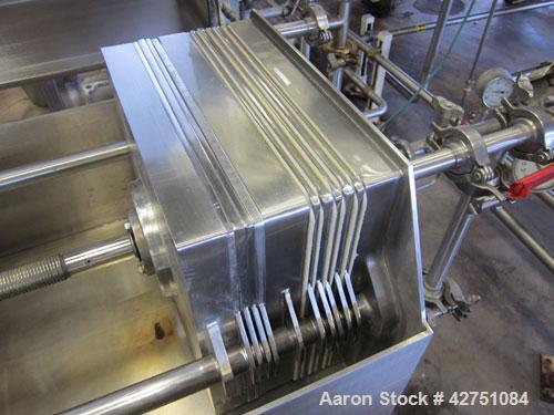 Used Ertel Vapor-Master Enclosed Plate & Frame Filter Press, Model EUS-16, 16'' x 16'', 316 Stainless Steel. (5) Plates, (4) Frames, (1) Spacer, (1) head, (1) tail. Manual ratchet closure. Approximat...