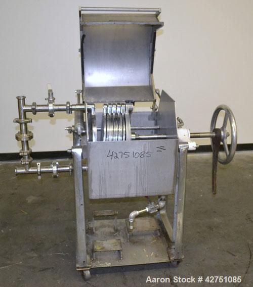 Used Ertel Plate & Frame Filter Press, Model EW-1158-304C-9A-55, 12" Diameter, 316 Stainless Steel. (5) Plates, (4) Frames, 3/8" thick. (1) Head, (1) tail. Manual closure. Approximate (0.065) cubic f...