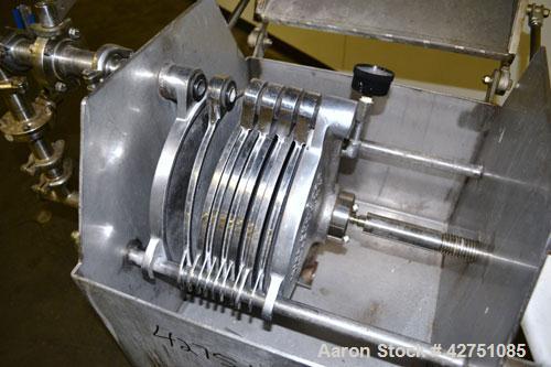 Used Ertel Plate & Frame Filter Press, Model EW-1158-304C-9A-55, 12" Diameter, 316 Stainless Steel. (5) Plates, (4) Frames, 3/8" thick. (1) Head, (1) tail. Manual closure. Approximate (0.065) cubic f...