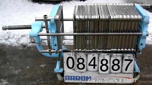 USED: Filtrox plate and frame polishing press, 304 stainless steel. 22 stainless steel plates 15-1/2" (400mm) x 15-1/2" (400mm) and 16 stainless steel frames 15-1/2" (400mm) x 15-1/2" (400mm), 1" thi...
