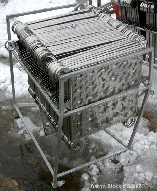 USED: Filtrox plate and frame polishing press, 304 stainless steel. 22 stainless steel plates 15-1/2" (400mm) x 15-1/2" (400mm) and 16 stainless steel frames 15-1/2" (400mm) x 15-1/2" (400mm), 1" thi...