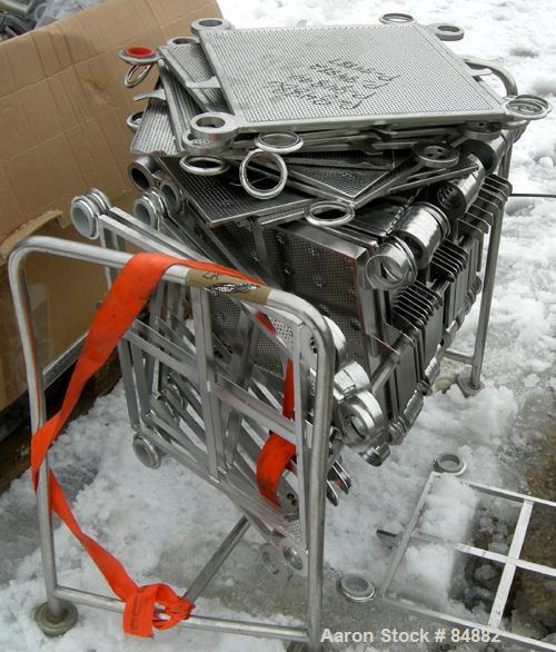 Used Filtrox-Werk Plate And Frame Polishing Press, 304 Stainless Steel. (16) stainless steel plates 15-1/2" (400 mm) x 15-1/2" (400 mm), 1 head, 1 tail and (6) stainless steel frames 15-1/2" (400 mm)...