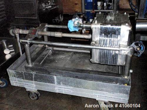 Used Hercules Filter Corporation Plate and Frame Filter Press, Model 16, Stainless Steel. (10) Approximately 16'' x 16'' plates, 4 eye, on portable base, serial #1454..