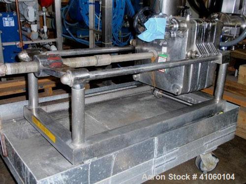 Used Hercules Filter Corporation Plate and Frame Filter Press, Model 16, Stainless Steel. (10) Approximately 16'' x 16'' plates, 4 eye, on portable base, serial #1454..