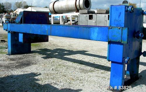 USED: JWI filter press, carbon steel frame. (83) 48" x 48" polypropylene plates, approximately 1300 square feet filter area, approximately 135 cubic feet cake capacity, 100 psi max filter pressure, h...