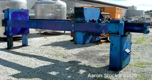 USED: JWI filter press, carbon steel frame. (83) 48" x 48" polypropylene plates, approximately 1300 square feet filter area, approximately 135 cubic feet cake capacity, 100 psi max filter pressure, h...