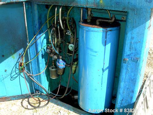 USED: JWI filter press, carbon steel frame. (83) 48" x 48" polypropylene plates, approximately 1300 square feet filter area, approximately 135 cubic feet cake capacity, 100 psi max filter pressure, h...