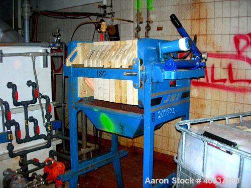 Used: JWI filter press, model 470G30-6-1-NA. (10) 18" X 18" X 2 1/2" thick x 1/2" recess polyproplene plates, (1) head, (1) tail plate. Approximately 21 square feet filter area, and 1 cubic feet cake...