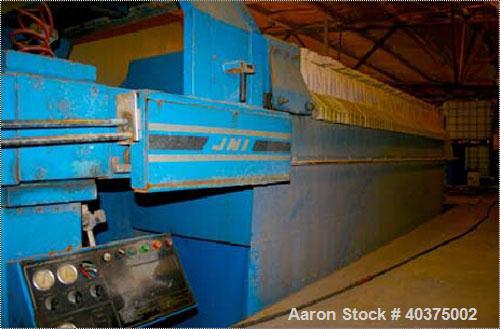 Used JWI filter press, 75 cubic feet, 1200G32-62-755A, 3506. Max filtration pressure 100 psi, hydraulic closing pressure 2800 psi. Contains new filter cloths.