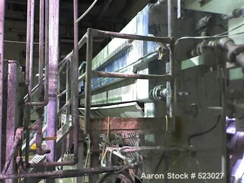 USED: JWI poly filter press, 85 frames 42" x 42", year 2001. Catwalkand 4" diaphragm pump, conveyor system underneath to a conveyorsystem to load the truck. Previously used for clay tiles.