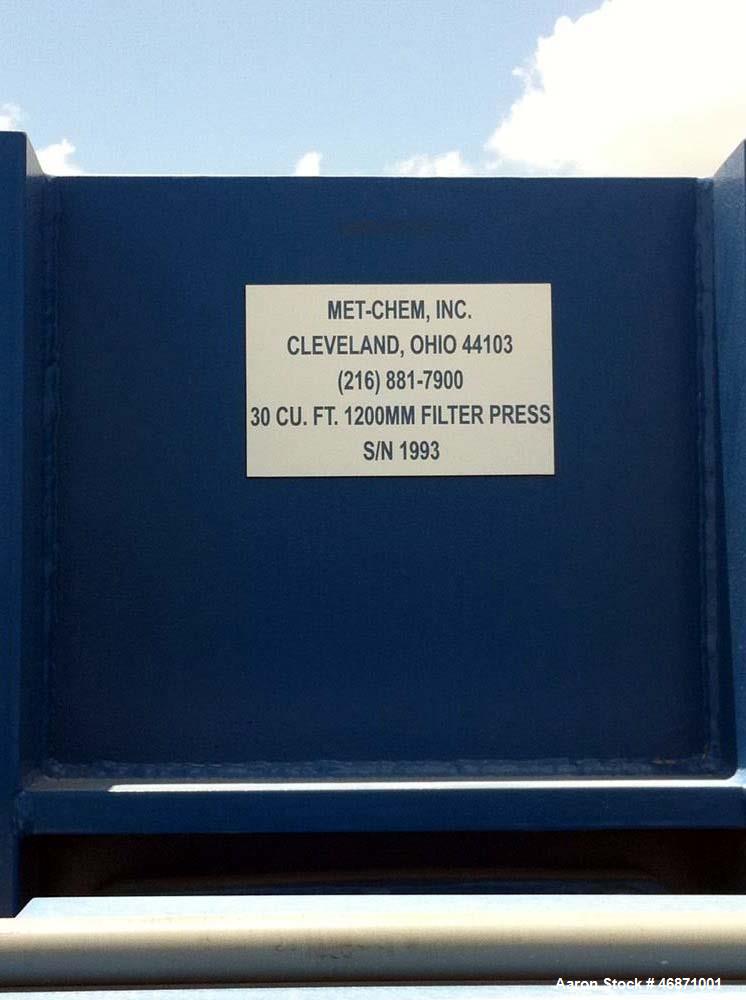 Unused- MetChem 30 Cubic Foot Hydraulic 1200 MM Filter Press. 25 gasket plates, fully automated, dumpsters included. Mfg. 2012.
