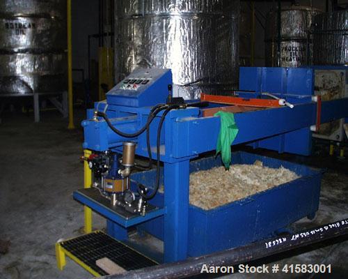 Used-Met-Chem Filter Press, 20 cubic feet, 1000 mm. Auto hydraulic closer, auto pump control with dumpsters.