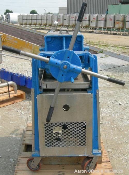 Used Plate and Frame Filter Press, 316 stainless steel. (7) 11"  X 11"  x 5/8" thick plates, (7) 11" x 11" 1" thick frames, (1) head, (1) tail plate. Approximately  11.76 square feet filter area,  .5...