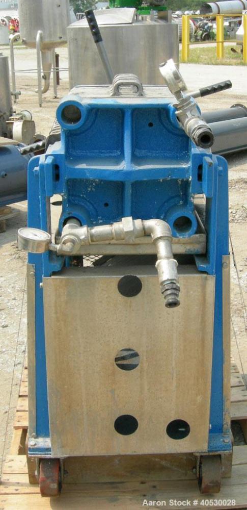 Used Plate and Frame Filter Press, 316 stainless steel. (7) 11"  X 11"  x 5/8" thick plates, (7) 11" x 11" 1" thick frames, (1) head, (1) tail plate. Approximately  11.76 square feet filter area,  .5...