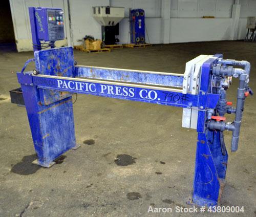 Used Pacific Press Filter Press Skeleton Only, Model P470E138A-3/5R. Requires 470mm plates. Maximum filter area 52-86 square feet, maximum cake capacity 3-5 cubic feet. Includes an automatic pump con...