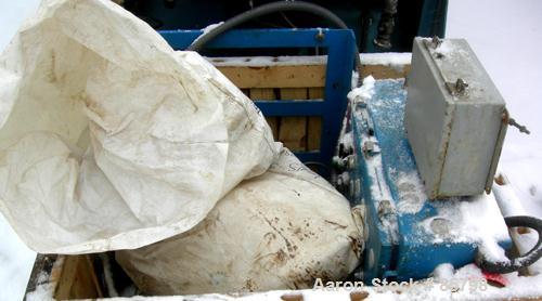 Used Perrin Filter Press, Model 1200MM. (54) 1200 mm (47.2" x 47.2") x 2-1/2" thick polypropylene plates, approximate 1/2" recess. Total filter area 1219 square feet. 50 cubic feet cake capacity. Hea...