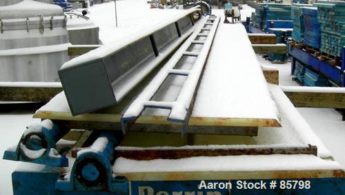 Used Perrin Filter Press, Model 1200MM. (54) 1200 mm (47.2" x 47.2") x 2-1/2" thick polypropylene plates, approximate 1/2" recess. Total filter area 1219 square feet. 50 cubic feet cake capacity. Hea...