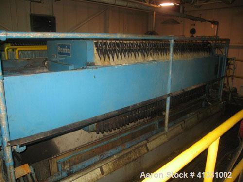 Used Perrin 1000 mm Filter Press. Press consists of 45 polypropylene filter plates. Top center feed, 4 corner discharge. 1-3/16" cake thickness. Approximately 40 cubic foot cake capacity. Approximate...