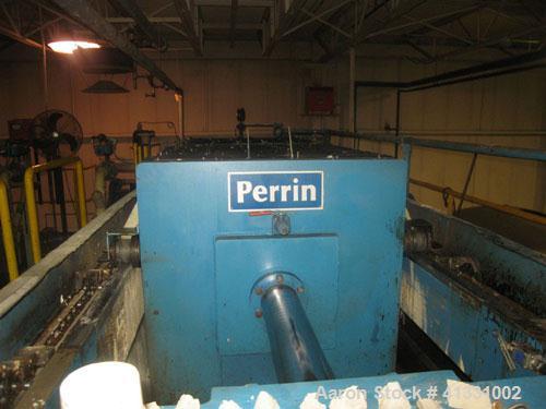 Used Perrin 1000 mm Filter Press. Press consists of 45 polypropylene filter plates. Top center feed, 4 corner discharge. 1-3/16" cake thickness. Approximately 40 cubic foot cake capacity. Approximate...
