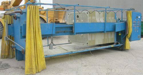 USED: Perrin filter press, (50) 59" x 59" polypropylene plates, approximate 1" cake. Approximate 82.69 cubic feet cake capacity, approximate 992.25 square feet of filter area. 3000 PSI cylinder closi...