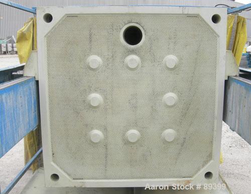 USED: Perrin filter press, (50) 59" x 59" polypropylene plates, approximate 1" cake. Approximate 82.69 cubic feet cake capacity, approximate 992.25 square feet of filter area. 3000 PSI cylinder closi...