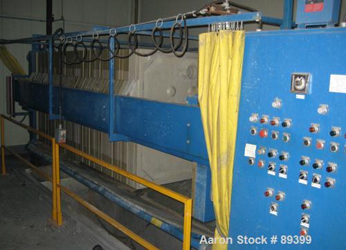 USED: Perrin filter press, (50) 59" x 59" polypropylene plates, approximate 1" cake. Approximate 82.69 cubic feet cake capacity, approximate 992.25 square feet of filter area. 3000 PSI cylinder closi...