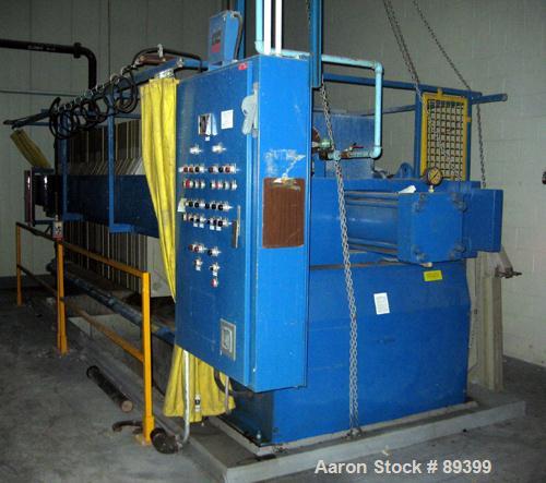 USED: Perrin filter press, (50) 59" x 59" polypropylene plates, approximate 1" cake. Approximate 82.69 cubic feet cake capacity, approximate 992.25 square feet of filter area. 3000 PSI cylinder closi...