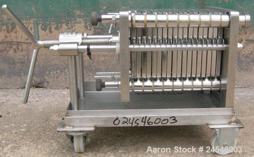 Used Seitz Enzinger Noll Pilot Polishing Press, Type 20/17. (18) 7" x 7" 316 stainless steel plates, approximately 1/2" thick.  Approximate 5.8 square feet filter area, (.24) cubic feet capacity. Man...