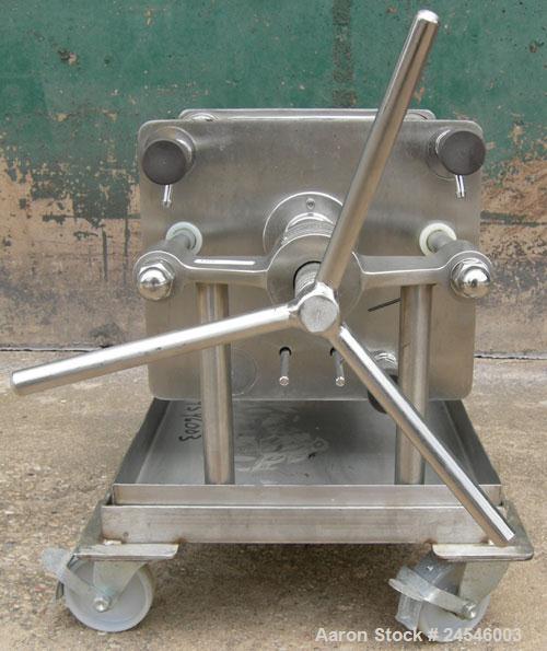 Used Seitz Enzinger Noll Pilot Polishing Press, Type 20/17. (18) 7" x 7" 316 stainless steel plates, approximately 1/2" thick.  Approximate 5.8 square feet filter area, (.24) cubic feet capacity. Man...
