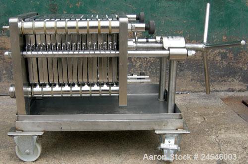 Used Seitz Enzinger Noll Pilot Polishing Press, Type 20/17. (18) 7" x 7" 316 stainless steel plates, approximately 1/2" thick.  Approximate 5.8 square feet filter area, (.24) cubic feet capacity. Man...