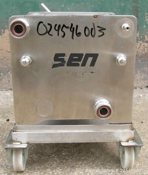 Used Seitz Enzinger Noll Pilot Polishing Press, Type 20/17. (18) 7" x 7" 316 stainless steel plates, approximately 1/2" thick.  Approximate 5.8 square feet filter area, (.24) cubic feet capacity. Man...