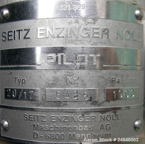 Used- Seitz Enzinger Noll Pilot Polishing Press, Type 20/17. (18) 7" x 7" 316 stainless steel plates, approximately 1/2" thi...