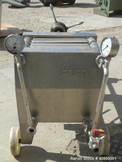 Used Seitz Filter Press, Type 40/30-A4. (4) 15" x 15" 316 stainless steel plates and (3) 15" x 15" x 1-1/2" thick, 316 stainless steel frames. Approximate 12.50 square feet filter area, (.78) cubic f...