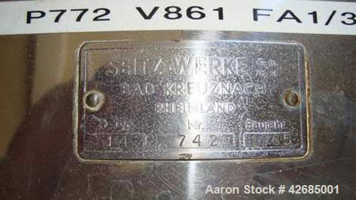 Used Seitz Polishing Press, 316 Stainless Steel. (15) stainless steel plates approximately 15" (400 MM) x 15" (400 MM), 1/2" thick, 1 head, 1 tail. Approximate 24.2 square feet filter area, approxima...