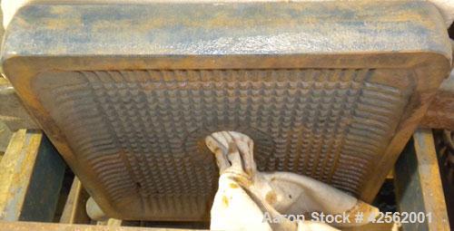 Used T. Shriver Filter Press, Size 12. (11) 12" x 12" Carbon steel plates, approximate 1" cake. Approximate 9.24 square feet filter area, (.77) cubic feet cake capacity. Center feed, end bottom disch...