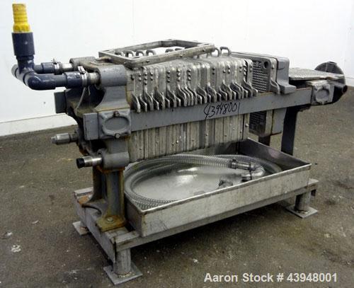 Used T. Shriver Filter Press, Size 12, 316 Stainless Steel.  (12) 12" x 12" x 1” thick frames, (14) 12” x 12” x 1/2” thick plates, (1) end frame.  Approximately 22 square feet filter area, 0.91 cubic...