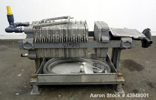 Used T. Shriver Filter Press, Size 12, 316 Stainless Steel.  (12) 12" x 12" x 1” thick frames, (14) 12” x 12” x 1/2” thick plates, (1) end frame.  Approximately 22 square feet filter area, 0.91 cubic...