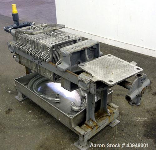 Used T. Shriver Filter Press, Size 12, 316 Stainless Steel.  (12) 12" x 12" x 1” thick frames, (14) 12” x 12” x 1/2” thick plates, (1) end frame.  Approximately 22 square feet filter area, 0.91 cubic...