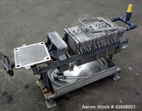 Used T. Shriver Filter Press, Size 12, 316 Stainless Steel.  (12) 12" x 12" x 1” thick frames, (14) 12” x 12” x 1/2” thick plates, (1) end frame.  Approximately 22 square feet filter area, 0.91 cubic...