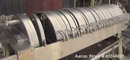 Used Star Systems Plate And Frame Polishing Press, Model 30-18A-SP-SH-SS, 304 Stainless Steel. (16) 18" Diameter x 1" thick plates and (21) 18" diameter x 1-1/2" thick frames. Approximate 47.28 squar...