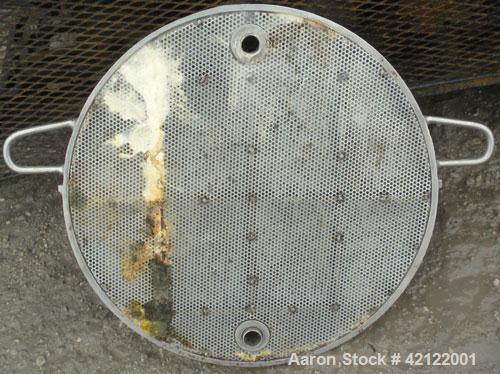 Used Star Systems Polishing Press, Model 12SS4-818-TIHO, Model Number 12-18B/1P, 304 Stainless Steel. (6) 18" diameter plates, (5) 2" thick frames. Approximate (.36) cubic feet cake capacity, approxi...