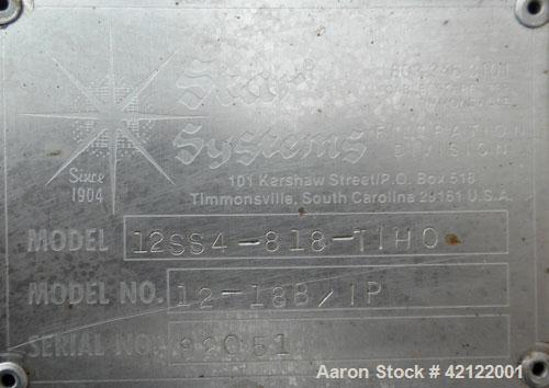 Used Star Systems Polishing Press, Model 12SS4-818-TIHO, Model Number 12-18B/1P, 304 Stainless Steel. (6) 18" diameter plates, (5) 2" thick frames. Approximate (.36) cubic feet cake capacity, approxi...