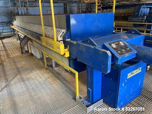 Micronics Model TR120DA08-FS-AO 130 cu ft. poly plate and frame press.