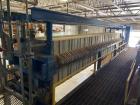 Netszch Model 1200-84/105 100 cu ft. Poly plate and frame press.