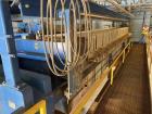 Netszch Model 1200-84/105 100 cu ft. Poly plate and frame press.