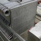 USED: APV Carlson polishing press, 304 stainless steel, 22 stainless steel plates 22 x 22. Approximately 370 square feet of filter area. 2