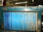 USED: Duriron plate and frame filter press with mild steel frame, hydraulic ram closure and approximately 40